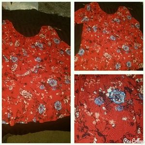 Red floral blouse.